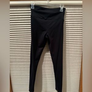 Woman’s black yoga pants